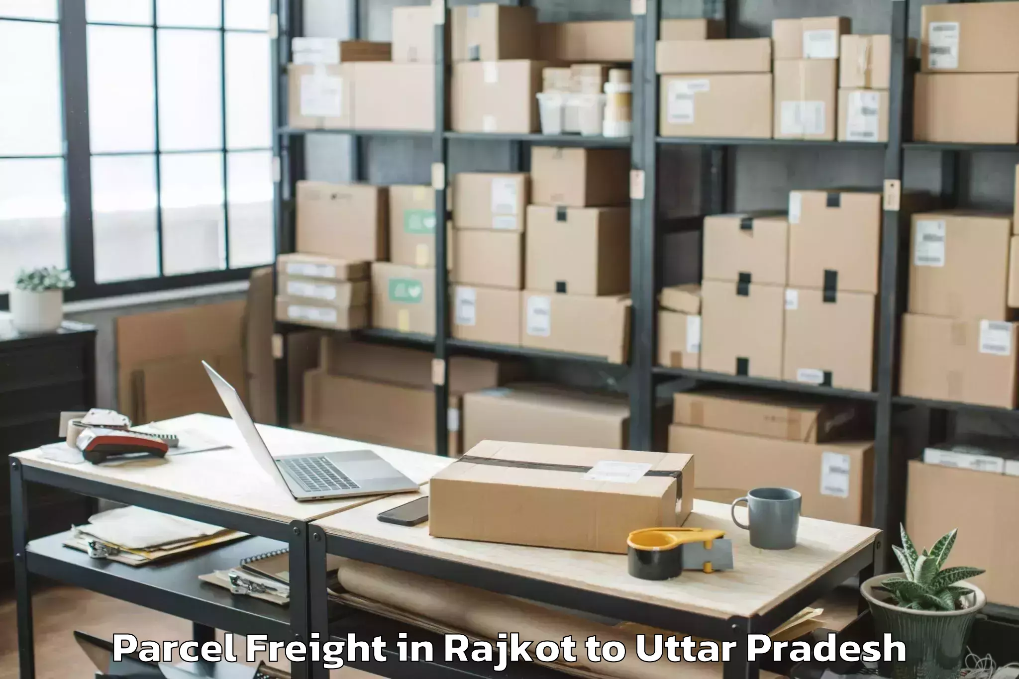 Trusted Rajkot to Bundelkhand University Jhansi Parcel Freight